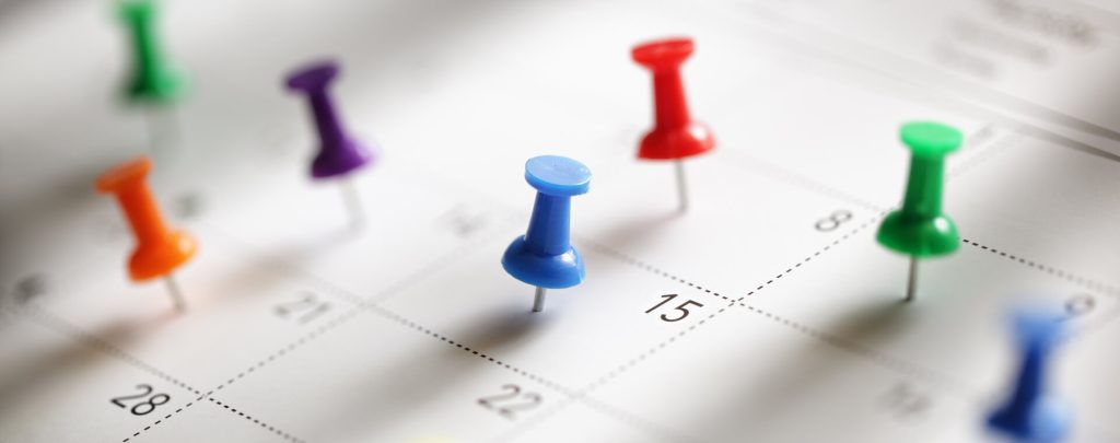 Calendar with thumb tacks